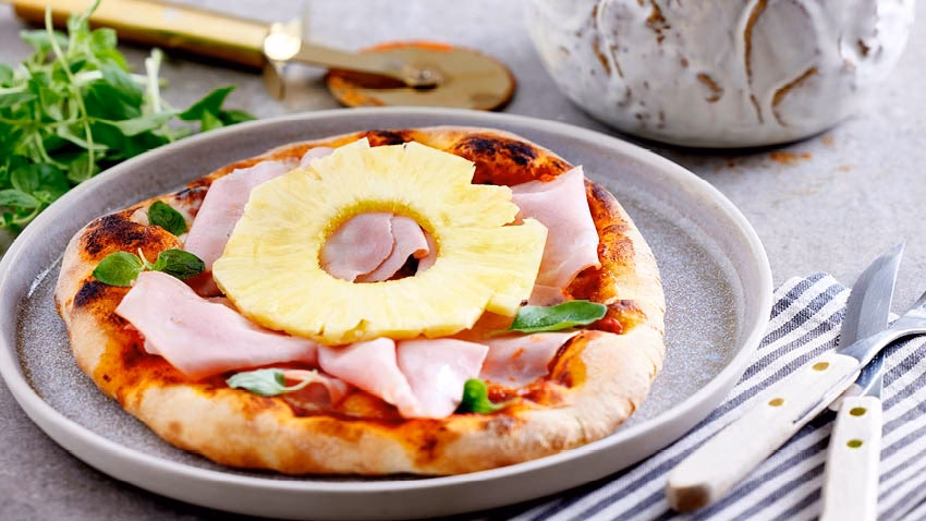 Hvor længe skal en pizza være i ovnen?